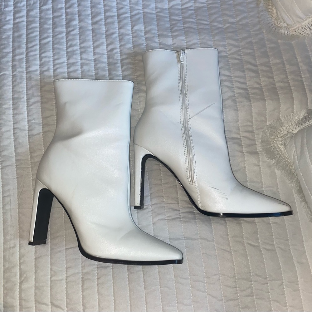 Tall white ankle boots